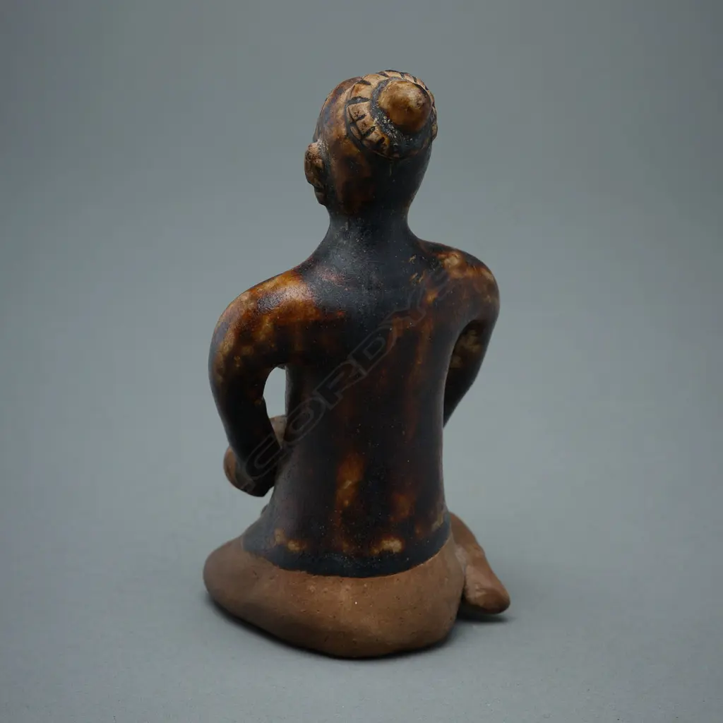 A Sawankhalok stoneware figure (tukatha), Image 1++